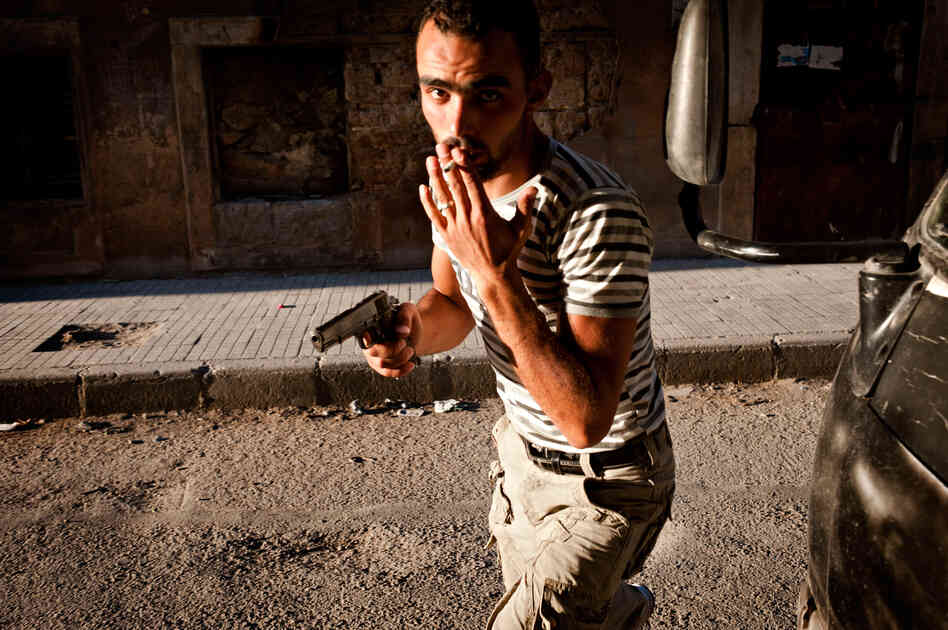 A Free Syrian Army fighter in the Bustan Pasha neighborhood of Aleppo, Syria, Aug. 21.