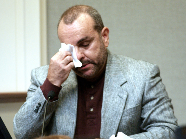 Paul LaRuffa wipes his eyes during John Allen Muhammad's Virginia trial as he describes being shot on Sept. 5, 2002. LaRuffa was shot five times by Muhammad's accomplice, 17-year-old Lee Boyd Malvo.