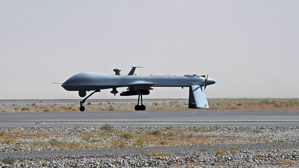 An unmanned U.S. Predator drone sits on the tarmac of Kandahar military airport in southern Afghanistan in 2010. The U.S. has been using drones in Pakistan for years. The Pakistanis initially claimed the drone attacks as the work of their own military, but the strikes have become a source of friction.