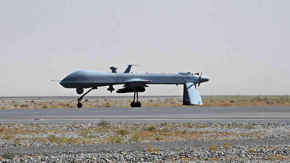 An unmanned U.S. Predator drone sits on the tarmac of Kandahar military airport in southern Afghanistan in 2010. The U.S. has been using drones in Pakistan for years. The Pakistanis initially claimed the drone attacks as the work of their own military, but the strikes have become a source of friction.