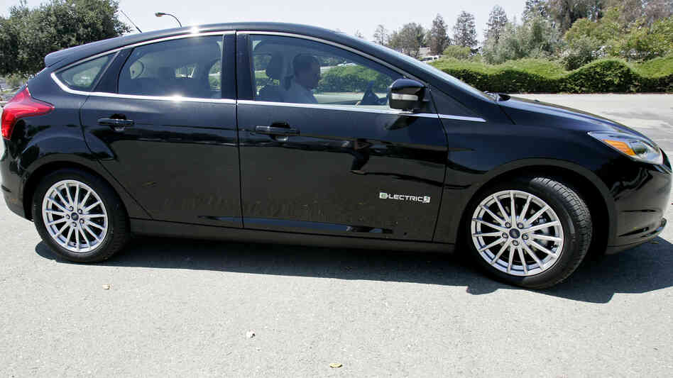 The Obama administration has set higher fuel economy standards for cars and promoted alternative energy sources. Here, a Ford Focus electric car is shown during a test drive in San Jose, Calif., in July.
