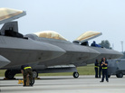 Air Force F-22 Raptors, made by Lockheed Martin, are prepared for flight operations at Langley Air Force Base. Despite the looming defense spending cuts that would go into effect in January if Congress does not pass a deficit reduction plan, Lockheed Martin and other defense contractors announced this week they would not issue layoff notices. Air Force F-22 Raptors, made by Lockheed Martin, are prepared for flight operations at Langley Air Force Base. Despite the looming defense spending cuts that would go into effect in January if Congress does not pass a deficit reduction plan, Lockheed Martin and other defense contractors announced this week they would not issue layoff notices.