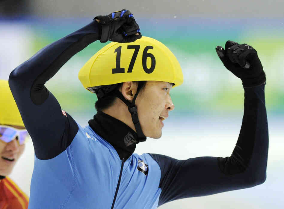 Simon Cho of the U.S. celebrates during the 500 meter men's final race at the Short Track Speed Skating World Cup in Dresden in 2011.