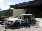 U.S. authorities are investigating whether al-Qaida played a role in last month's attack on the U.S. Consulate in Benghazi. Here, a damaged vehicle sits outside the consulate one day after the attack. U.S. authorities are investigating whether al-Qaida played a role in last month's attack on the U.S. Consulate in Benghazi. Here, a damaged vehicle sits outside the consulate one day after the attack.