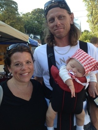 Wendy Leedy, John Gaugush and 3-month-old Isabel at the annual craft fair in Occoquan. Says Gaugush: