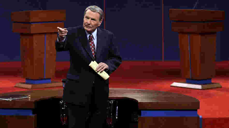 Moderator Jim Lehrer addresses the audience before the first presidential debate at the University of Denver on Wednesday