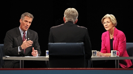 Republican U.S. Sen. Scott Brown (left) answers a question during a debate against Democratic challenger Elizabeth Warren on Monday at the University of Massachusetts in Lowell, Mass. Republican U.S. Sen. Scott Brown (left) answers a question during a debate against Democratic challenger Elizabeth Warren on Monday at the University of Massachusetts in Lowell, Mass.