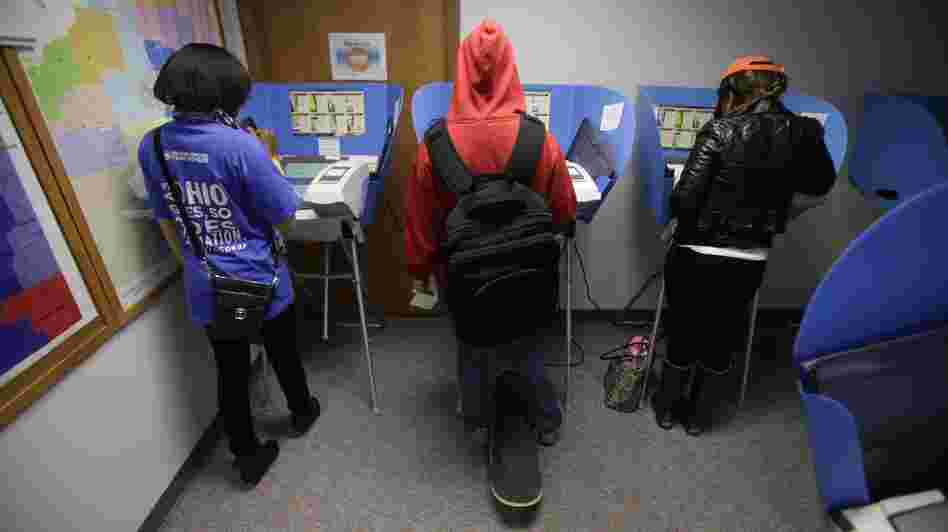 Voters cast their ballots during early voting in Bowling Green, Ohio. Early voting began Oct. 2 in the battleground state, five weeks before Election Day on November 6.