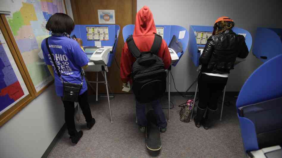 Voters cast their ballots during early voting in Bowling Green, Ohio. Early voting began Oct. 2 in the battleground state, five weeks before Election Day on November 6.