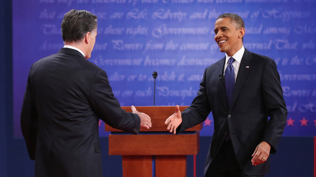 President Obama and Republican challenger Mitt Romney greet one another before Wednesday's debate in Denver.