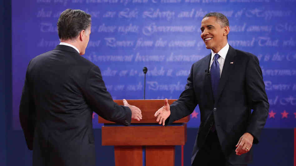 President Obama and Republican challenger Mitt Romney greet one another before Wednesday's debate in Denver.