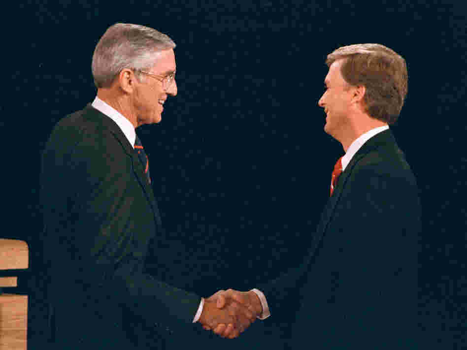 Sen. Lloyd Bentsen (D-Texas) shakes hands with Sen. Dan Quayle (R-Ind.) before their vice presidential debate at the Omaha Civic Auditorium in Omaha, Neb., on Oct. 5, 1988.