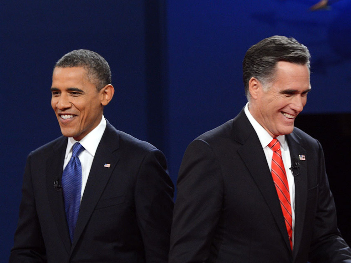 President Obama and Republican presidential candidate Mitt Romney finish their debate at the University of Denver on Oct. 3.