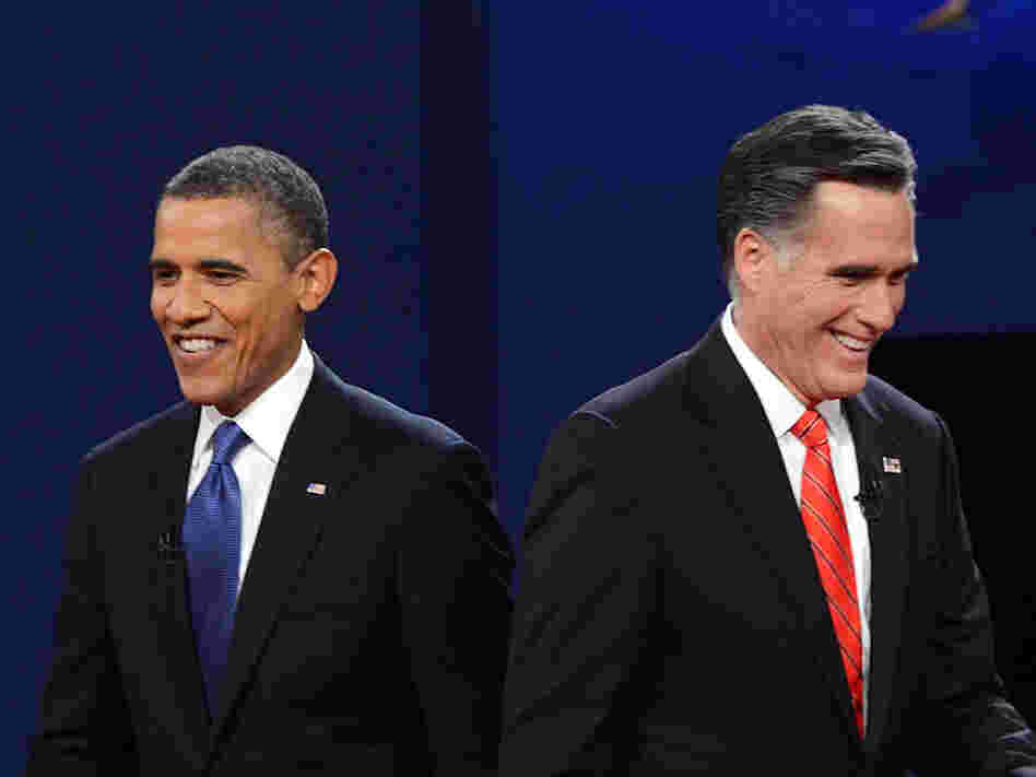 President Obama and Republican presidential candidate Mitt Romney finish their debate at the University of Denver on Oct. 3.