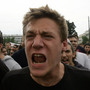Demonstrators shout slogans during a protest against German Chancellor Angela Merkel's visit to Greece on Tuesday.