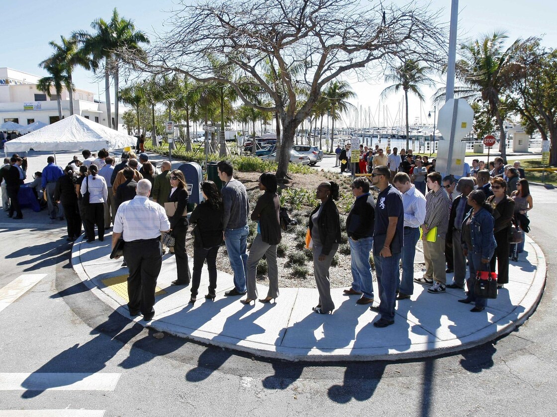 Job seekers line up to register at a Miami job fair in January. A new study shows that Florida voters discuss joblessness in ways quite different from those in Ohio and Virginia, two other presidential battleground states.