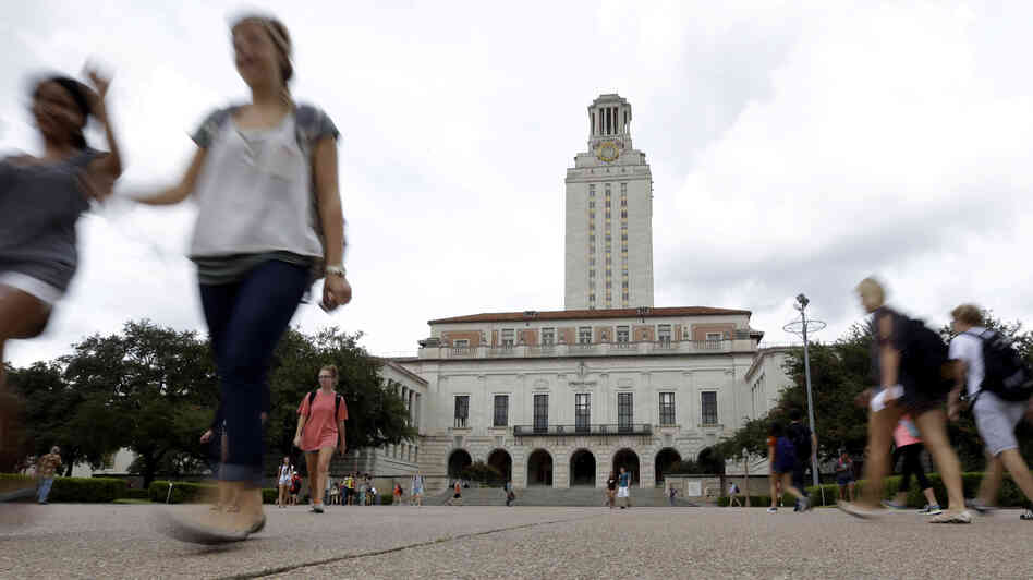Students walk through the University of Texas, Austin, campus near the school's iconic tower on Sept. 27.
