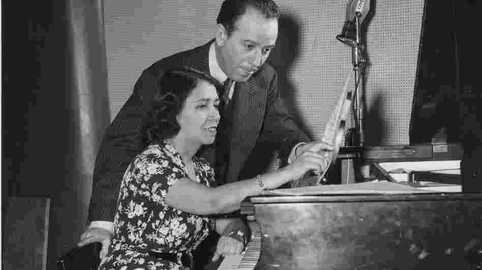 Clotilde Arias (seated) with composer and arranger Terig Tucci, circa 1943.
