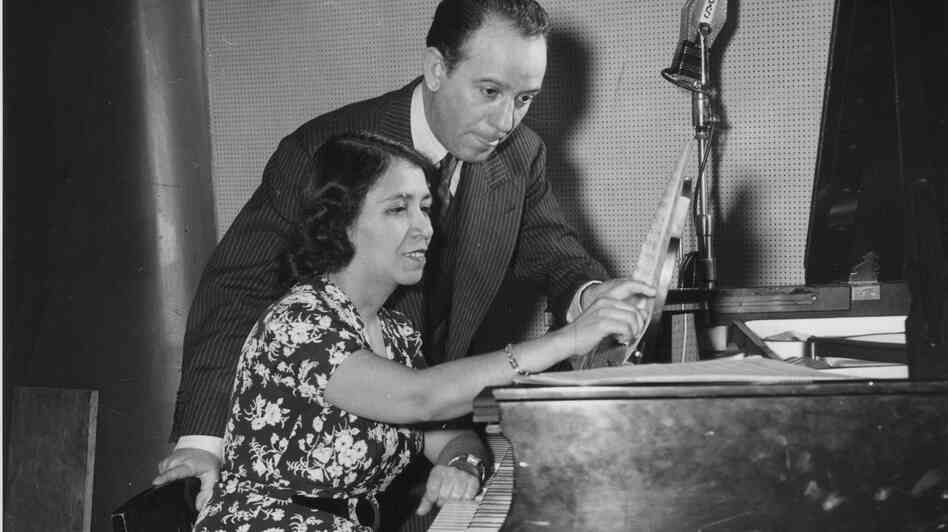 Clotilde Arias (seated) with composer and arranger Terig Tucci, circa 1943.