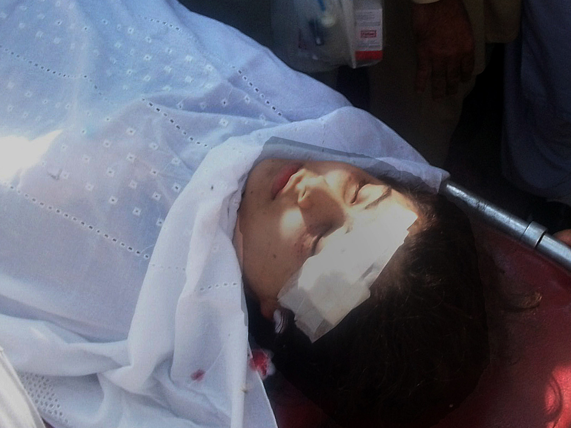 Malala Yousufzai on a stretcher as she was being taken to a hospital earlier today in Mingora, Pakistan.
