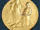 The medal for the Nobel in Physics. According to the Nobel committee, the inscription reads: " 'Inventas vitam juvat excoluisse per artes' loosely translated 'And they who bettered life on earth by their newly found mastery.' "