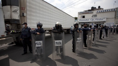 Sept. 1, 2010: Police stood guard by a truck containing some of the bodies of immigrants killed by members of the Zetas drug cartel in Tamaulipas state. Sept. 1, 2010: Police stood guard by a truck containing some of the bodies of immigrants killed by members of the Zetas drug cartel in Tamaulipas state.