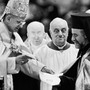 Pope Paul VI hands Orthodox Metropolitan Meliton of Heliopolis a decree during the December 1965 session of the Roman Catholic Ecumenical Council in Vatican City. The decree cancels excommunications that led to the break between the Roman and Orthodox churches nine centuries before.
