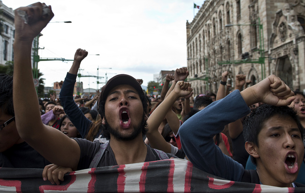 Students take part in a demonstration to commemorate the massacre of Tlatelolco, in Mexico City, on Oct. 2, 2012.