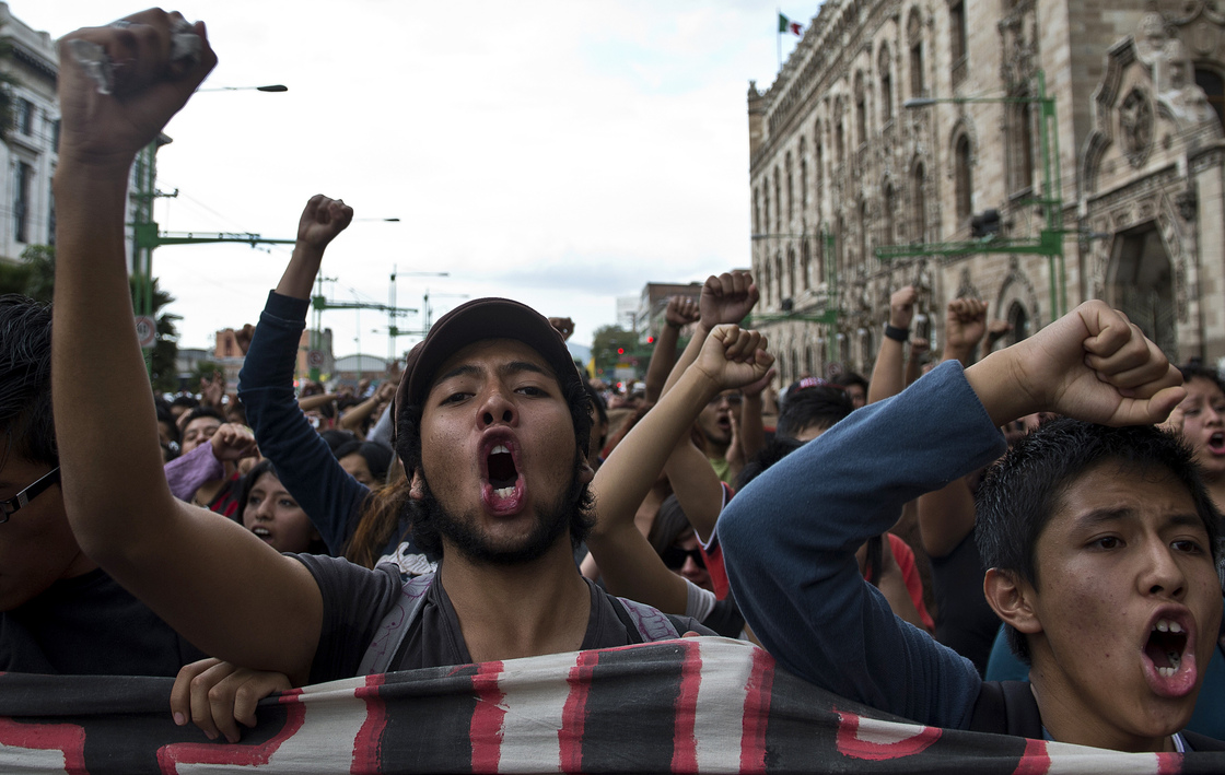 Students take part in a demonstration to commemorate the massacre of Tlatelolco, in Mexico City, on Oct. 2, 2012.