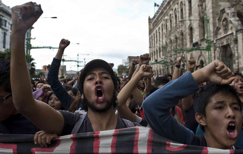 Students take part in a demonstration to commemorate the massacre of Tlatelolco, in Mexico City, on Oct. 2, 2012.