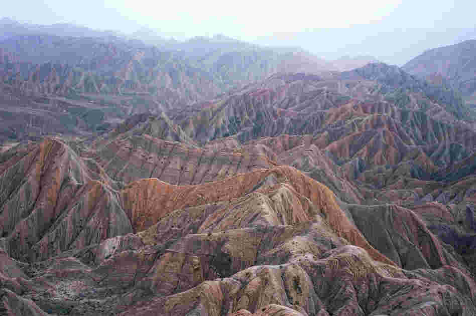 The Kuruman family lives in a village in a remote part of western China's Xinjiang region. The harsh environment has, until now, preserved their community and culture. The construction of a highway could change that.