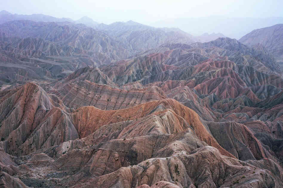 The Kuruman family lives in a village in a remote part of western China's Xinjiang region. The harsh environment has, until now, preserved their community and culture. The construction of a highway could change that.