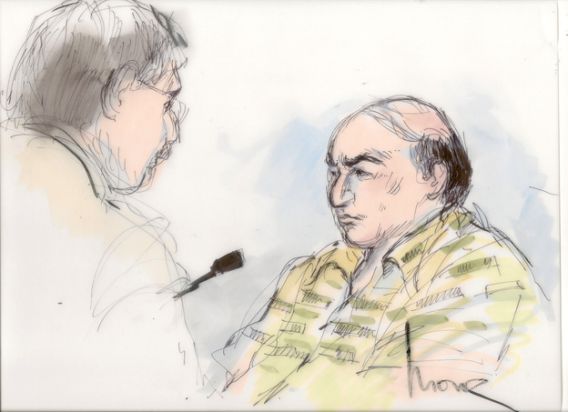 This Sept. 27, file courtroom sketch shows Mark Basseley Youssef, right, talking with his attorney Steven Seiden in court.