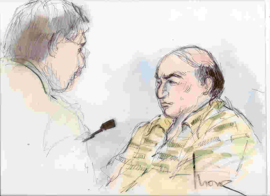 This Sept. 27, file courtroom sketch shows Mark Basseley Youssef, right, talking with his attorney Steven Seiden in court.