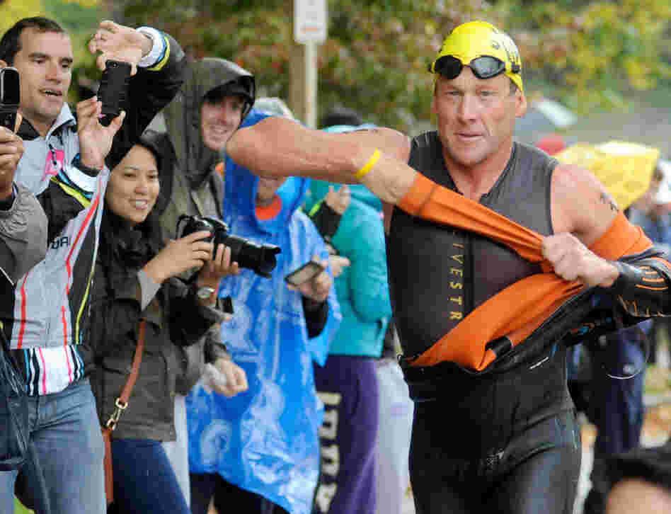 Lance Armstrong competes in the Rev3 Half Full Triathalon Sunday in Ellicott City, Md. Armstrong joined other cancer survivors in the event, which raised funds for the Ulman Cancer Fund for Young Adults.