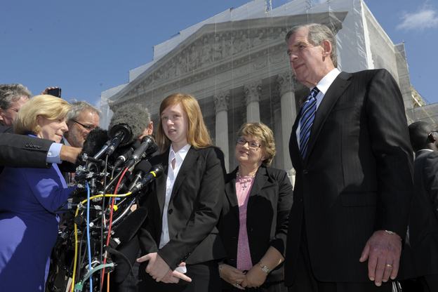 Abigail Fisher, the Texan involved in the University of Texas affirmative action case, talks to reporters outside the Supreme Court in Washington on Wednesday.