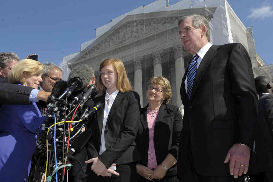 Abigail Fisher, the Texan involved in the University of Texas affirmative action case, talks to reporters outside the Supreme Court in Washington on Wednesday. Abigail Fisher, the Texan involved in the University of Texas affirmative action case, talks to reporters outside the Supreme Court in Washington on Wednesday.