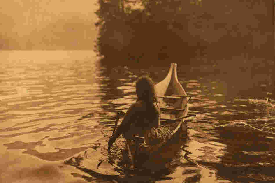 "A [Clayoquot] medicine-woman, alone is seeking a solitary place in which to perform her rites of bodily purification ... " reads the Curtis caption.