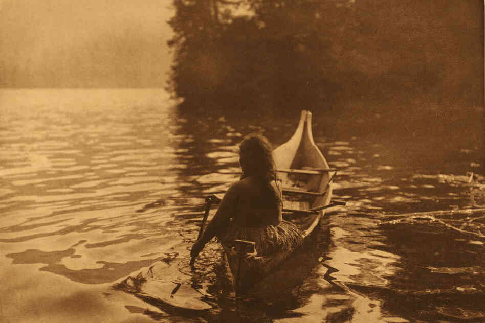 "A [Clayoquot] medicine-woman, alone is seeking a solitary place in which to perform her rites of bodily purification ... " reads the Curtis caption.