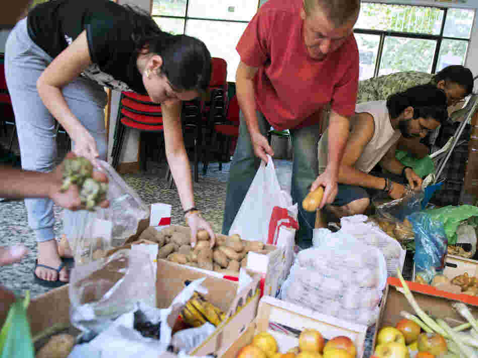 In June, people in Madrid came to a distribution center where those in need could get food.