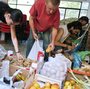 In June, people in Madrid came to a distribution center where those in need could get food.