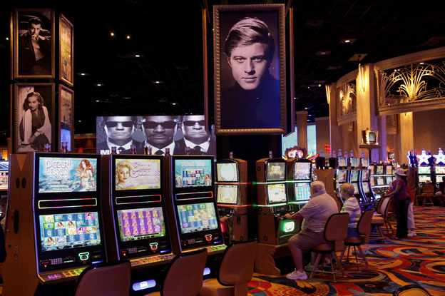 Gamblers play slots during the grand opening of the Hollywood Casino in Toledo, Ohio, in May. It was the second casino to open in the state.