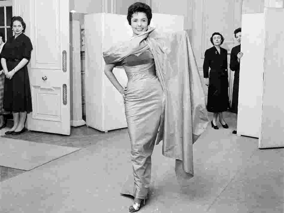 Lena Horne, the sultry American singer who appeared in several musicals in the '40s and was a regular of the Cotton Club, trying on a dress May 4, 1956.