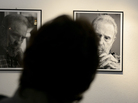 A visitor watches pictures taken by Cuban photographer and cinematographist Alex Castro, son of former Cuban president Fidel Castro. A visitor watches pictures taken by Cuban photographer and cinematographist Alex Castro, son of former Cuban president Fidel Castro.