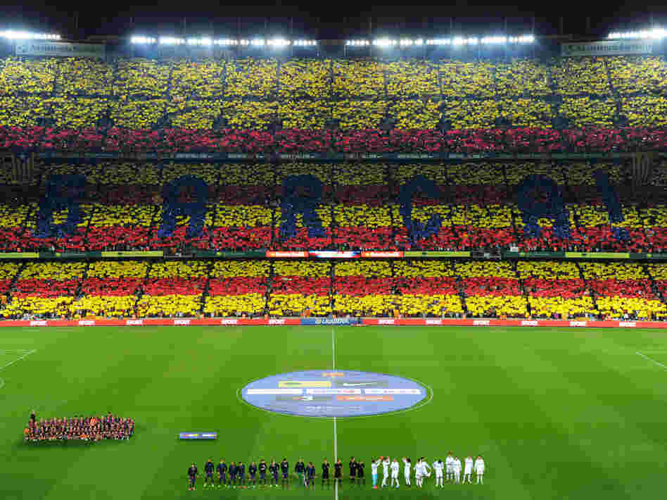 Fans of FC Barcelona form a Catalan flag in the stands before the start of a match between Barcelona and archrival Real Madrid in Barcelona earlier this month.