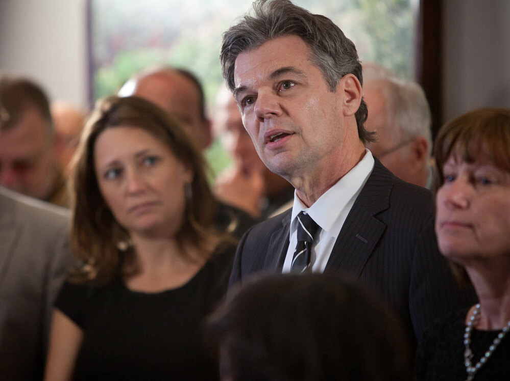 Surrounded by his family and supporters, Democrat Jim Graves announces his candidacy for Congress on April 10 in St. Cloud, Minn.