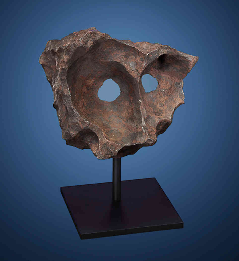 Meteor Masquerade: Another fragment of the Gibeon meteorite, which crashed into Namibia in prehistoric times. Namibian tribesmen discovered this specimen, known as the Gibeon Mask, in 1992. Estimated price: $140,000-$180,000.