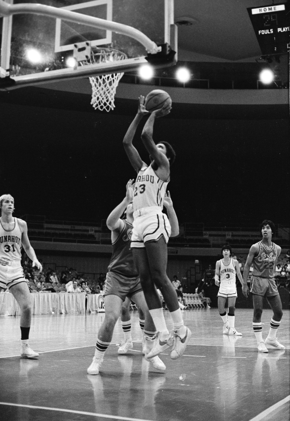 Obama shoots the ball while playing for the Punahou School basketball team in 1979. Obama shoots the ball while playing for the Punahou School basketball team in 1979.