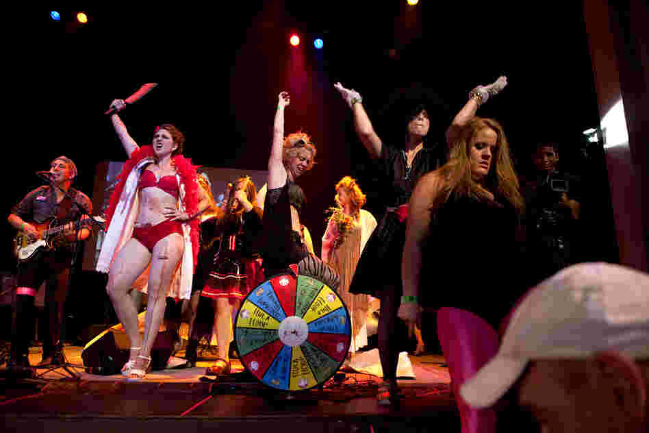"SuperCLAW" is a women's arm wrestling event that draws competitors from leagues around the county. Each woman dons an alter-ego for an evening of sport and theatrics. 