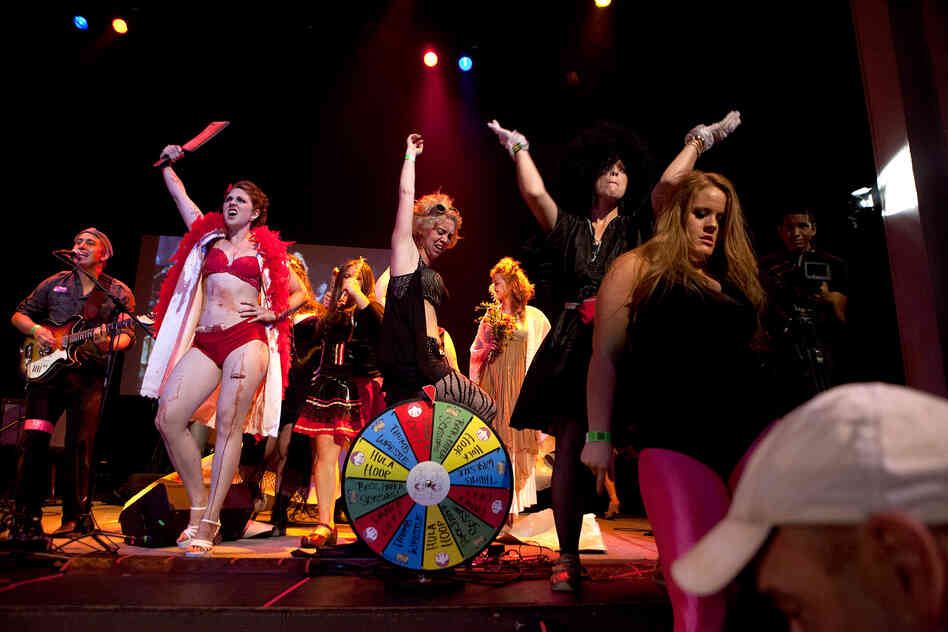 "SuperCLAW" is a women's arm wrestling event that draws competitors from leagues around the county. Each woman dons an alter-ego for an evening of sport and theatrics. 